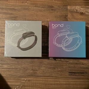 bond touch bracelets. pair set. unopened.